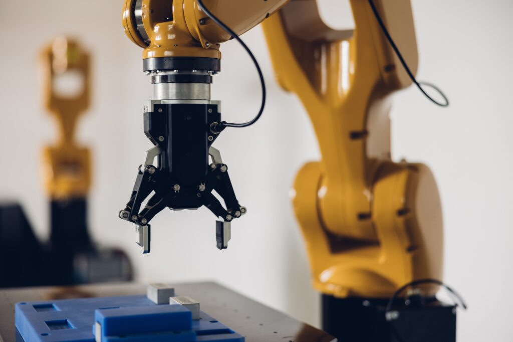 New Generation Robotic Arm Ready for Work on a Production Line.